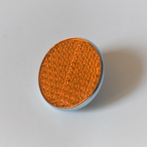 Odrazka oranžový, zinkowana rámeček, se šroubem, 57 mm, plast, Jawa, ČZ