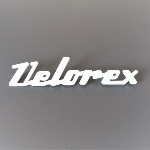 Inscription VELOREX, plastic, white