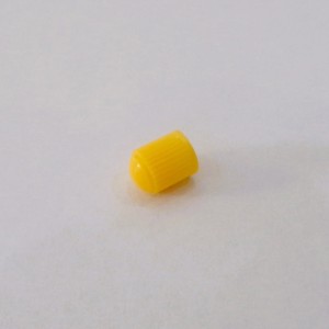 Cap for inner tube valve, plastic, yellow, Jawa, CZ