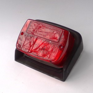 Lampa tylna, czerwona, z osłoną, oryginał, Jawa 640